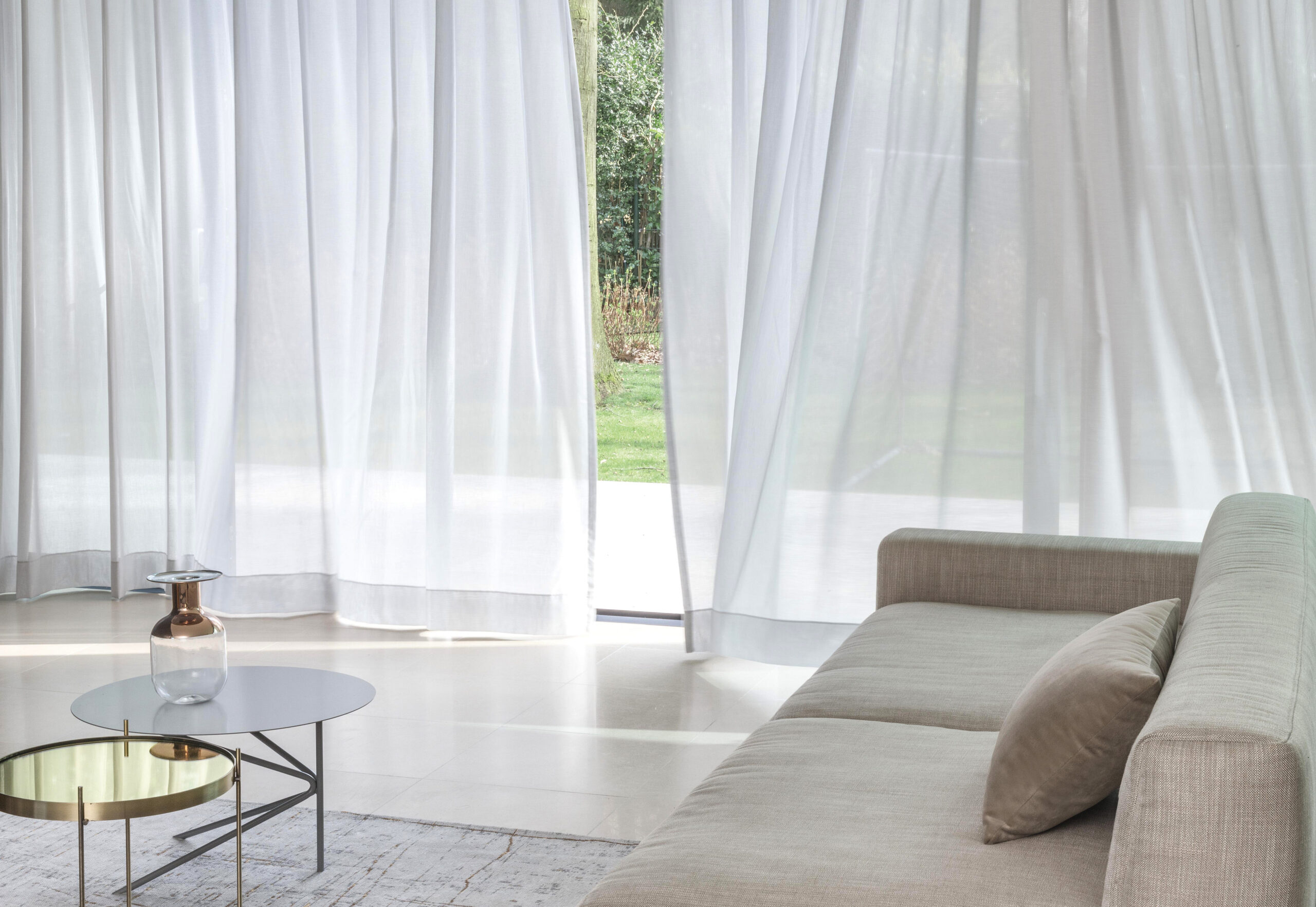 pinch pleat sheer curtains for a timeless window treatment